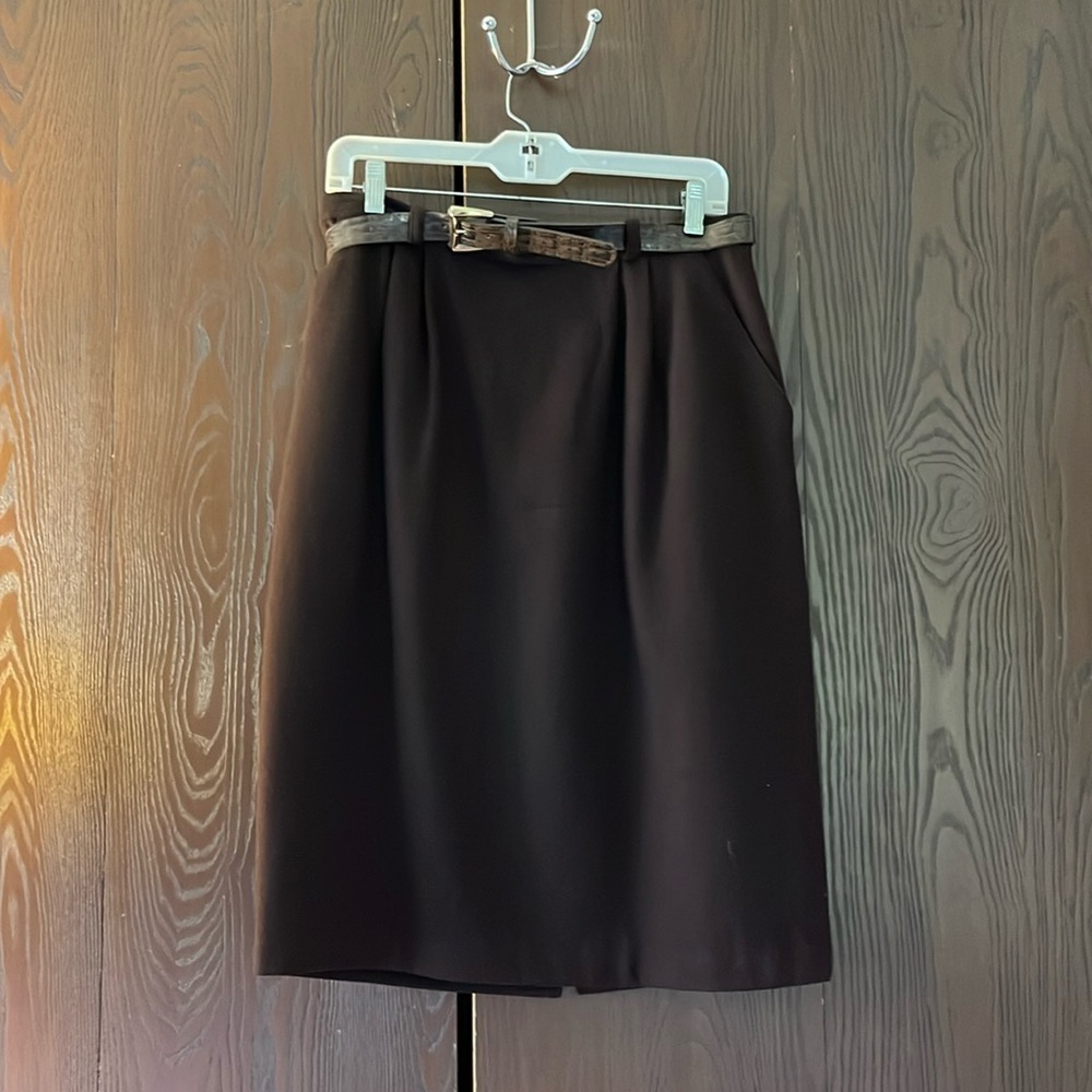Requirements 100% wool dark brown skirt. Size 12.